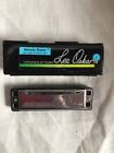L1910mme Lee Oskar New Natural Minor Harmonica Key Of Blue Label