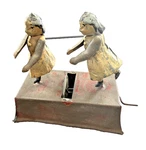 Antique German? Penny Toy Tin Wind Two Girls Dancing Twirling Hand Painted. Fixed Price $135.00.