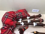 Roosebeck Bagpipe W/ Red Tartan Cover. Fixed Price $114.95.