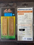 2 Packs Of Lee Oskar Music Maker Reed Plates In The Key G. Fixed Price $50.00.