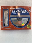 Mud Puddle How To Play Harmonica Book & Cd Brand New Sealed Fast Shipping Box. Fixed Price $15.00.