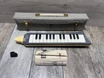 Hohner Melodica Piano 26 With Case & Original Paperwork. Fixed Price $65.00.