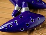 Ohuhu Legend Of Zelda Ocarina 12 Hole Alto With Textbook Display Stand. Fixed Price $14.00.
