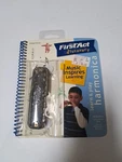 First Act Discovery Learn And Play Chrome Harmonica Key Of Instruction Book. Fixed Price $15.00.