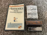 Pocket Pal Hohner Harmonica W/box & For The Musically Hopeless Booklet. Fixed Price $24.99.