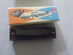 Vintage 10 Hole Harmonica For Kids & Adults Beginner Music Instrument Gift Toy. Fixed Price $9.00.