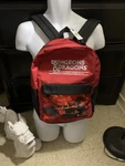 Dungeons & Dragons Red Black Graphic Print Polyester Kids Backpack. Fixed Price $40.00.