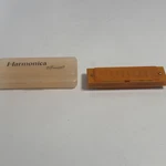 Vintage Toysmith Harmonicas Item 8071 Translucent Orange Case Clean. Fixed Price $19.99.
