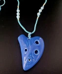 Ocarina Pendant 6 Holes Blue Musical Instrument Key Necklace. Fixed Price $30.00.