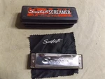 Pre-owned 10 Hole Chrome Harmonica Sawtooth Screamer Key Of G Box & Cloth. Fixed Price $7.99.