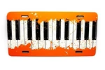 Musical Musician Pianist Piano Keys Metal Car Novelty License Plate Tag. Fixed Price $17.95.