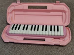 Suzuki Melodion Pink Keyboard Harmonica With Case. Fixed Price $51.95.