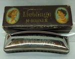 Vtg Unsere Lieblinge Hohner Curved Harmonica Key Of Original Box Germany. Fixed Price $24.95.