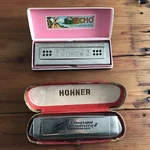 Vtg Hohner Harmonica Echo Harp (c/g) & Chromonica Ii De Luxe In Boxes Germany. Fixed Price $90.00.