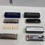 Set Of 4 Hohner Harmonicas. Pro Harp Ms In A. Blues C. And 2 More.. Fixed Price $32.00.