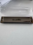 Brookstone Pocket Harmonica 16 Notes Musical Instrument - Used. Fixed Price $14.99.