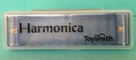 Toysmith Harmonica Translucent Blue In Clear Plastic Case. Fixed Price $9.99.