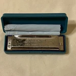 Johnson Blues King Harmonica, Key Of With Case. Fixed Price $18.00.