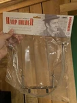 Hohner HH01 Universal Rubberized Neck Brace 10-HOLE Harmonica Holder Silver. Fixed Price $25.00.
