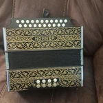 Hohner Accordion Black Gold, 8 Bass, 21 Treble, 29 Buttons. Fixed Price $600.00.