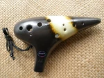 New Utopia Panda White Excellent Alto 12 Holes Ocarina Collectible. Fixed Price $42.00.