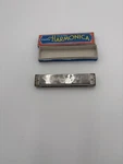 Schylling Harmonica 16 Hole Play Collect Silver Metal Green Plastic Original Box. Fixed Price $11.70.