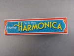 Schylling Harmonica 16 HOLE..5 1/4 Fun To Play 3+ Silver/green Rowley Ma China. Fixed Price $9.99.