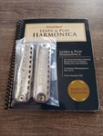 First-act Learn & Play Book And Audio Cd With 2 Harmonicas. Fixed Price $19.99.