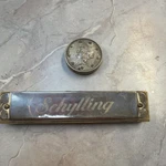 Vintage Windsor - Japan Cigarette Lighter And Schilling Harmonica. Fixed Price $35.00.