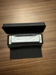 Pre-owned 10 Hole Chrome Harmonica Sawtooth Screamer Key Of G Box & Cloth. Fixed Price $15.00.
